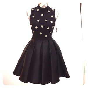 Black cocktail dress with rhinestones..